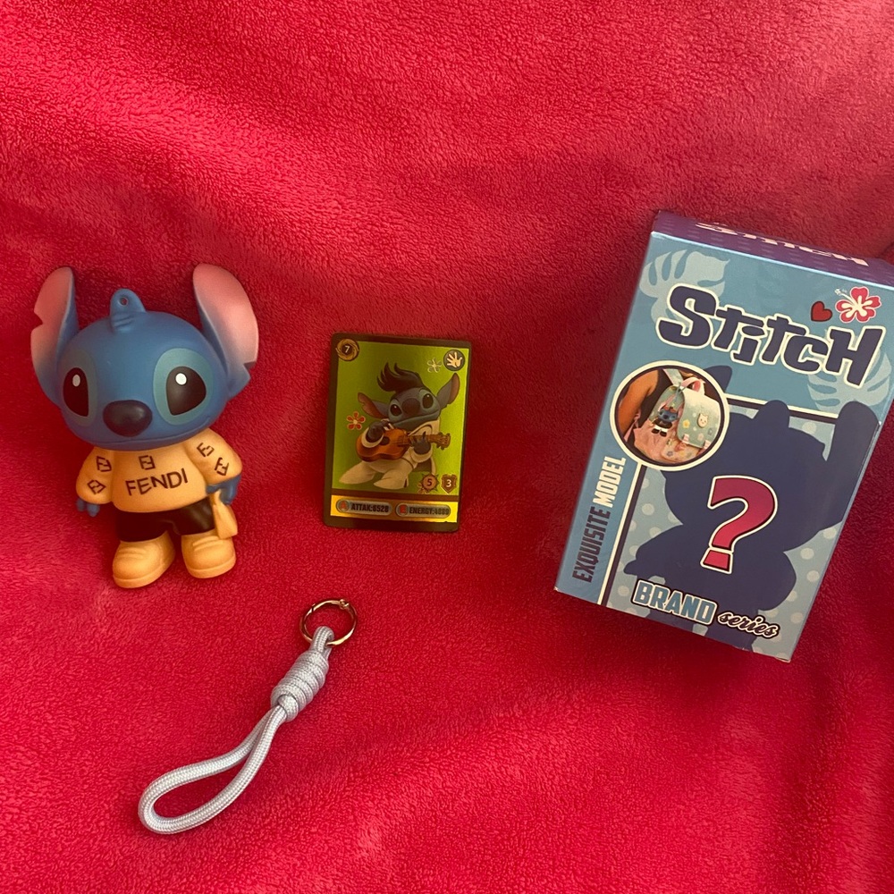 Stitch Collectible Figure in Branded Sweater